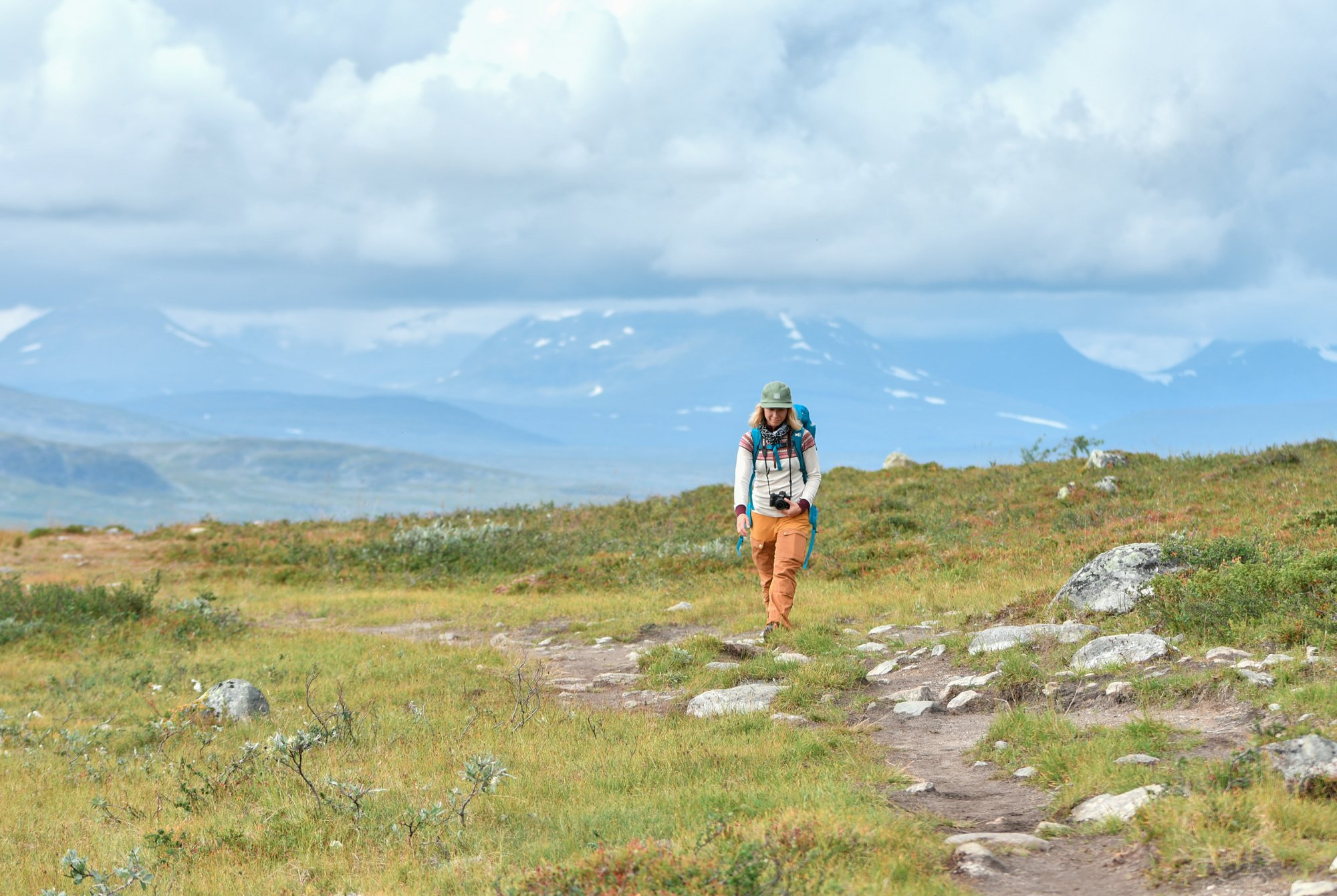 A hiker on the trail in the Malla Strict Nature Reserve in Kilpisjärvi Finnish Lapland