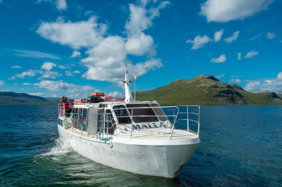 Malla boat in Kilpisjärvi taking visitors to see the Three Nations' border point.